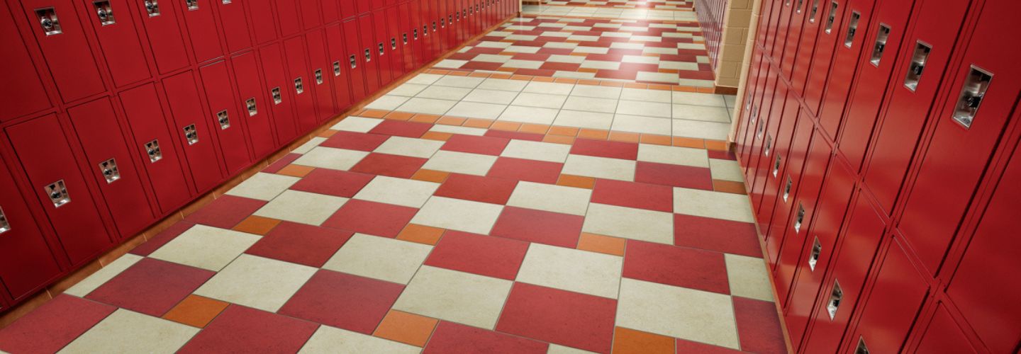 School Corridor with Red Lockers Colorful Argent Tile in Red, Orange, and White