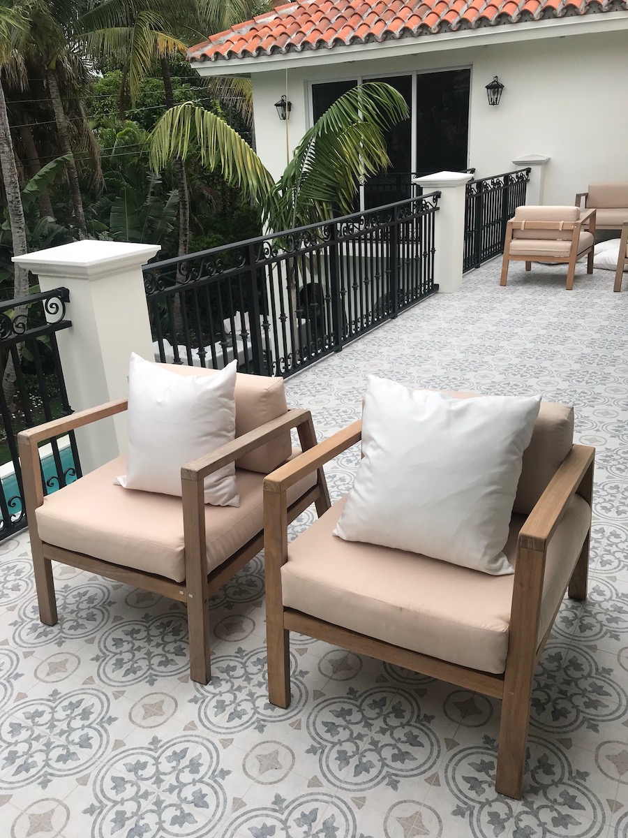 Exterior patio with encaustic patterned porcelain tile floor