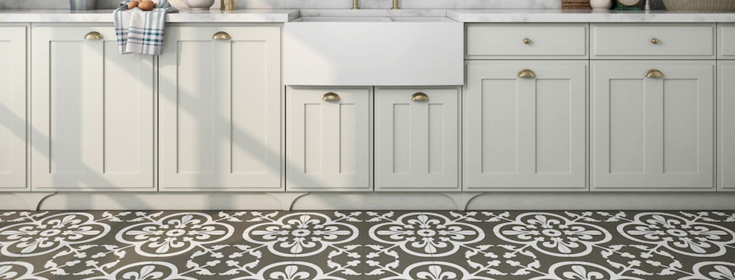 Kitchen with encaustic patterned porcelain tile floor